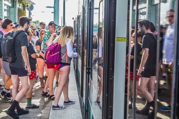 No Pants Light Rail Day: Valley Metro riders crowd tram