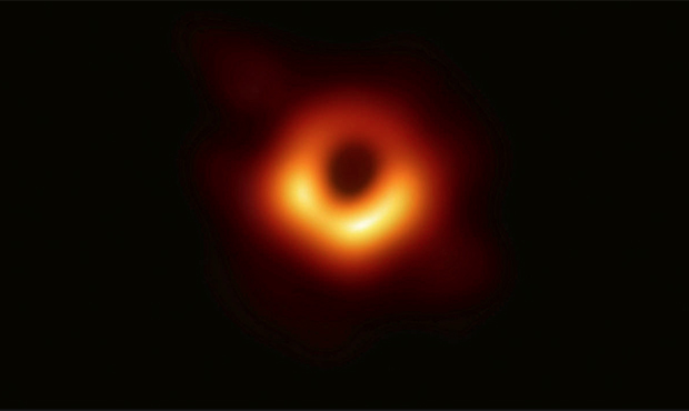 This image released Wednesday, April 10, 2019, by Event Horizon Telescope shows a black hole. Scien...