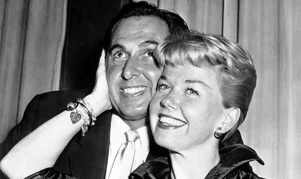 FILE - In this April 12, 1955 file photo, film actress and singer Doris Day poses with her husband ...