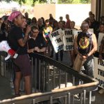 Protesters line up before the Phoenix City Council meeting June 19, 2019. (KTAR News Photo/Peter Samore)