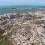 
              The destruction caused by Hurricane Dorian is seen from the air, in Marsh Harbor, Abaco Island, Bahamas, Wednesday, Sept. 4, 2019. The death toll from Hurricane Dorian has climbed to 20. Bahamian Health Minister Duane Sands released the figure Wednesday evening and warned that more fatalities were likely. (AP Photo/Gonzalo Gaudenzi)
            