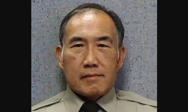 Officer Gene "Jim" Lee (MCSO Photo)...
