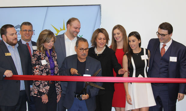 Mesa City Councilman David Luna does the honors during a ribbon-cutting ceremony at the new Urbix R...