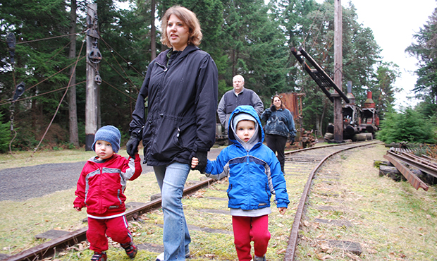 Susan Powell and her sons, Charlie and Braden, walk ahead of Chuck and Judy Cox during a visit to P...