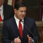 Arizona Republican Gov. Doug Ducey speaks during his State of the State address as he talks about Arizona's economy, new jobs, education, prison reform, and the state revenue on the opening day of the legislative session at the Capitol Monday, Jan. 13, 2020, in Phoenix. (AP Photo/Ross D. Franklin)