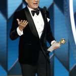 
              This image released by NBC shows Tom Hanks accepting the Cecil B. DeMille Award at the 77th Annual Golden Globe Awards at the Beverly Hilton Hotel in Beverly Hills, Calif., on Sunday, Jan. 5, 2020. (Paul Drinkwater/NBC via AP)
            