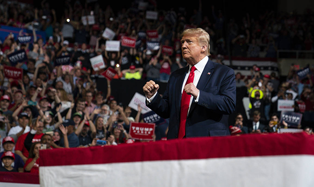 President Donald Trump arrives to speak at a campaign rally at Veterans Memorial Coliseum, Wednesda...