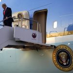 President Donald Trump arrives at Phoenix Sky Harbor International Airport to attend a campaign rally, Wednesday, Feb. 19, 2020, in Phoenix. (AP Photo/Evan Vucci)