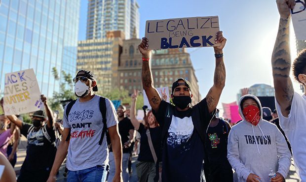 Protesters march in downtown Phoenix on June 6, 2020. (KTAR News Photo/Gabriel Gamiño)...