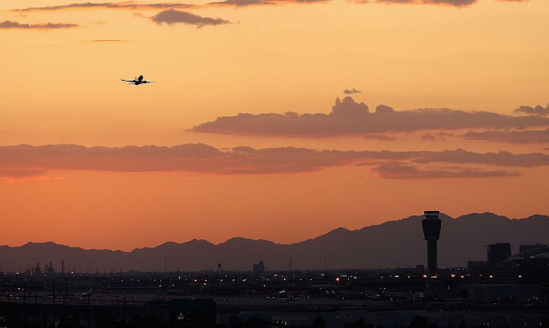 General view of the sunset over Sky Harbor Airport from Sun Devil Stadium before the college footba...