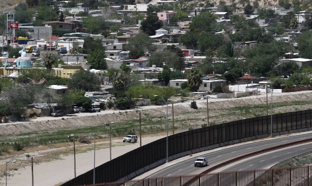 In this April 22, 2020, file photo a residential neighborhood of Juarez, Mexico, and U.S. Border Pa...