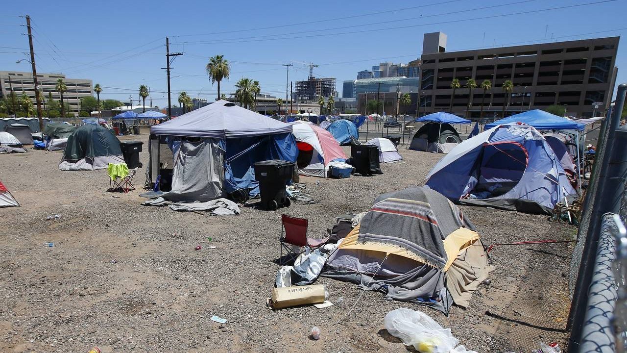 A large homeless encampment is shown Wednesday, Aug. 5, 2020, in Phoenix. Maricopa County officials...