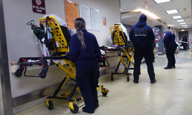 Patients arrive for treatment in the emergency room at Roseland Community Hospital on December 15, ...
