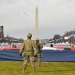 Members of the National Guard stand on the National Mall near the U.S. Capitol before the inauguration of U.S. President-elect Joe Biden and Vice President-elect Kamala Harris on Jan. 20, 2021, in Washington, D.C. (Getty Images/Stephanie Keith)