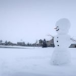 A snowman stands in a field in Bellemont, Ariz. on Monday, Jan. 25, 2021. A series of winter storms have dropped more precipitation in Flagstaff than the city had during last summer's monsoon season. The recent snow measured as water topped the amount of rain that fell from mid-June through September, the driest monsoon season on record. (AP Photo/Felicia Fonseca)