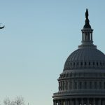 Marine One with President Donald Trump and first lady Melania Trump aboard flies over the U.S. Capitol as they depart the White House ahead of the inauguration of U.S. President-elect Joe Biden on Jan. 20, 2021, in Washington, D.C. Law enforcement and state officials are on high alert for potentially violent protests as Biden is sworn in as the 46th president of the United States at today's inauguration ceremony. (Getty Images Photo/ Spencer Platt)