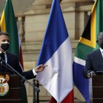 
              South African President Cyril Ramaphosa, right, and his French counterpart Emmanuel Macron speak during a press conference at the government's Union Building, in Pretoria, South Africa, Friday, May 28, 2021. Macron is on a two-day official visit to the country. (AP Photo/Themba Hadebe, Pool)
            