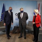 
              Britain's Prime Minister Boris Johnson, center, meets with European Commission President Ursula von der Leyen and European Council President Charles Michel, left, during the G7 summit in Cornwall, England, Saturday June 12, 2021. (Peter Nicholls/Pool via AP)
            