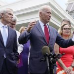 
              President Joe Biden, with a bipartisan group of senators, speaks Thursday June 24, 2021, outside the White House in Washington. Biden invited members of the group of 21 Republican and Democratic senators to discuss the infrastructure plan. From left are, Sen. Rob Portman, R-Ohio, Sen. Bill Cassidy, R-La., Sen. Lisa Murkowski, R-Alaska, Biden, Sen, Joe Manchin, D-W.Va., rear, Sen. Kyrsten Sinema, D-Ariz, and Sen. Mark Warner, D-Va.. (AP Photo/Jacquelyn Martin)
            