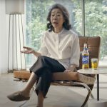 
              In this image made from an undated commercial video, South Korean actor Youn Yuh-jung “Minari”, 74 years old, sits in the beer company Oriental Brewery's latest advertising campaign. Named “Time to be Real,” the beer advertisement video starts as the camera closes in on the Oscar-winning actress’s face, saying, “For someone like me to be on a beer ad, the world has gotten so much better.” (Oriental Brewery via AP)
            