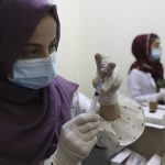 
              A doctor fills a syringe with the Sinopharm COVID-19 vaccine at a vaccination center, in Kabul, Afghanistan, Wednesday, June 16, 2021. (AP Photo/Rahmat Gul)
            
