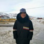 
              FILE - In this May 7, 2020 photo provided by Aaron Watson, his son, Owen, 12, stands for a portrait in Iqaluit, the capital of Nunavut territory in far north Canada. Though at the time there were no known cases of coronavirus in his town, Owen's school closed as a precaution. He thought it's only a matter of time before the virus arrives there. Iqaluit has a population of about 7,000 people, many of whom are Inuit. (Aaron Watson via AP, File)
            