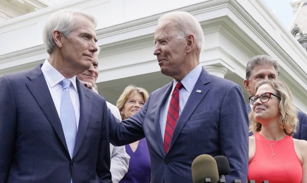President Joe Biden speaks with Sen. Rob Portman, R-Ohio, and other bipartisan group of senators, T...
