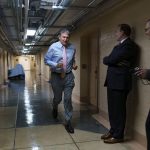 
              Sen. Joe Manchin, D-W.Va., one of the key Senate infrastructure negotiators, rushes back to a basement room at the Capitol as he and other Democrats work behind closed doors, in Washington, Wednesday, June 16, 2021. (AP Photo/J. Scott Applewhite)
            