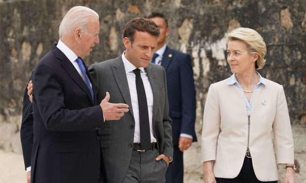 President Joe Biden speaks with French President Emmanuel Macron and European Commission President ...