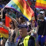 
              People take part in the Equality Parade, the largest gay pride parade in central and eastern Europe, in Warsaw, Poland, Saturday June 19, 2021. The event has returned this year after a pandemic-induced break last year and amid a backlash in Poland and Hungary against LGBT rights.(AP Photo/Czarek Sokolowski)
            