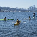 
              Ruby Gawlik, from left, Angela Tsai, Sage Leibenson and Jon Tsubota take to the water of Lake Union in the morning during a heat wave hitting the Pacific Northwest, Sunday, June 27, 2021, in Seattle. Yesterday set a record high for the day with more record highs expected today and Monday. (AP Photo/John Froschauer)
            