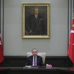 
              FILE - In this April 26, 2021, file photo, Turkey's President Recep Tayyip Erdogan, backdropped by a painting depicting modern Turkey's founder Mustafa Kemal Ataturk, chairs his government's cabinet in Ankara, Turkey. President Joe Biden and Turkish counterpart Erdogan have known each other for years, but their meeting Monday, June 14, 2021, will be their first as heads of state. And it comes at a particularly tense moment for relations between their two countries. (Turkish Presidency via AP, File)
            