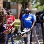 
              Jessica Fortune Barker, cofounder of Lift Our Vote, speaks about voting rights during the John Lewis Advancement Act Day of Action, a voter education and engagement event Saturday, May 8, 2021, in front of Brown Chapel A.M.E. Church in Selma, Ala. (AP Photo/Vasha Hunt)
            
