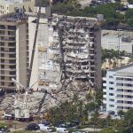 
              Crews work in the rubble at the Champlain Towers South Condo, Sunday, June 27, 2021, in Surfside, Fla. One hundred fifty-nine people were still unaccounted for two days after Thursday's collapse. (AP Photo/Gerald Herbert)
            