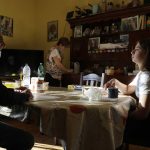 
              Elena Maria Moretti, right, has her breakfast with her parents, Massimo Moretti and Letizia Perracchio, at their house in Rome, Thursday, June 3, 2021. Last year, she was dancing alone in her bedroom and spraying disinfectant on packages the family received. Italy was among the first to experience huge death counts because of COVID-19. (AP Photo/Gregorio Borgia)
            