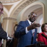 
              Sen. Raphael Warnock, D-Ga., center, flanked by Senate Majority Leader Chuck Schumer, D-N.Y., left, and Sen. Amy Klobuchar, D-Minn., talks to reporters before a key test vote on the For the People Act, a sweeping bill that would overhaul the election system and voting rights, at the Capitol in Washington, Tuesday, June 22, 2021. The bill is a top priority for Democrats seeking to ensure access to the polls and mail in ballots, but it is opposed by Republicans as a federal overreach. (AP Photo/J. Scott Applewhite)
            