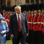 
              FILE - In this July 13, 2018, file photo U.S. President Donald Trump and Britain's Queen Elizabeth II inspect a Guard of Honour, formed of the Coldstream Guards at Windsor Castle in Windsor, England. (AP Photo/Matt Dunham, Pool, File)
            