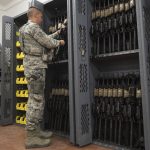 
              In this Oct. 26, 2018, photo made available by the U.S. Air Force, a 7th Reconnaissance Squadron security forces patrolman checks weapons at Naval Air Station Sigonella, Italy. In the first public accounting of its kind in decades, an Associated Press investigation has found that at least 1,900 US military firearms were lost or stolen during the 2010s, with some resurfacing in violent crimes.  Because some armed services have suppressed the release of basic information, AP’s total is a certain undercount. (Staff Sgt. Ramon A. Adelan/U.S. Air Force via AP)
            