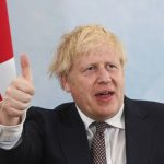 
              Britain's Prime Minister Boris Johnson gestures during a meeting with U.S. President Joe Biden (not pictured) ahead of the G7 summit, at Carbis Bay Hotel, Carbis Bay, Cornwall, Britain, Thursday June 10, 2021. (Toby Melville/Pool Photo via AP)
            