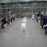 
              Residents wait for a dose of the AstraZeneca COVID-19 vaccine at the Central Vaccination Center in Bangkok, Thailand, Thursday, July 22, 2021. (AP Photo/Sakchai Lalit)
            