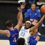 
              FILE - In this Dec. 1, 2020, file photo, Kentucky's Isaiah Jackson (23) grabs a rebound next to Kansas' Mitch Lightfoot (44) during an NCAA college basketball game in Indianapolis. Jackson was selected in the first round of the NBA draft Thursday, July 29. (AP Photo/Darron Cummings, File)
            