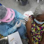 
              A health worker administers a shot of the AstraZeneca COVID-19 vaccine at the Central Vaccination Center in Bangkok, Thailand, Thursday, July 22, 2021. (AP Photo/Sakchai Lalit)
            