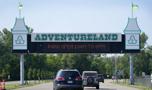 Visitors arrive at the Adventureland Park amusement park, Tuesday, July 6, 2021, in Altoona, Iowa. ...