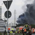 
              A dark cloud of smoke rises above the Chempark in Leverkusen, Germany, Tuesday, July 27, 2021. After an explosion, fire brigade, rescue forces and police are currently in large-scale operation, the police explained.(Oliver Berg/dpa via AP)
            