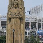 
              A guardian rests on the Hope Memorial Bridge within site of Progressive Field, Friday, July 23, 2021, in Cleveland. Cleveland's new name was inspired by two large landmark stone edifices near the downtown ballpark, referred to as traffic guardians, on the Hope Memorial Bridge over the Cuyahoga River. The team's colors will remain the same, and the new Guardians' new logos will incorporate some of the architectural features of the bridge. (AP Photo/Tony Dejak)
            