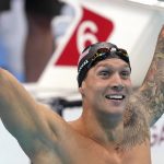 
              Caeleb Dressel of the United States celebrates winning the men's 100-meter freestyle final at the 2020 Summer Olympics, Thursday, July 29, 2021, in Tokyo, Japan. (AP Photo/Matthias Schrader)
            