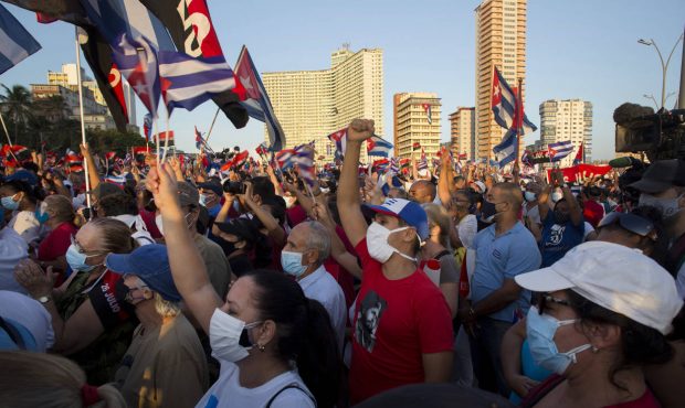 People attend a cultural-political event on the seaside Malecon Avenue with thousands of people in ...