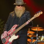 
              FILE - Dusty Hill of ZZ Top performs during the Stagecoach Festival on April 25, 2015, in Indio, Calif. ZZ Top has announced that Hill, one of the Texas blues trio's bearded figures and bassist, has died at his Houston home. He was 72. In a Facebook post, bandmates Billy Gibbons and Frank Beard revealed Wednesday, July 28, 2021, that Hill had died in his sleep. (Photo by Paul A. Hebert/Invision/AP, File)
            