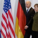 FILE - In this Feb. 1, 2013 file photo, German Chancellor Angela Merkel, right, and United States' Vice President Joe Biden walk at the chancellery in Berlin, Germany. Angela Merkel has just about seen it all when it comes to U.S. presidents. Merkel on Thursday makes her first visit to the White House since Joe Biden took office. He is the fourth American president of her nearly 16-year tenure as German chancellor. (AP Photo/Markus Schreiber,file)