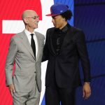 
              NBA Commissioner Adam Silver greets Cade Cunningham who was picked as the number one overall pick by the Detroit Pistons during the NBA basketball draft, Thursday, July 29, 2021, in New York. (AP Photo/Corey Sipkin)
            